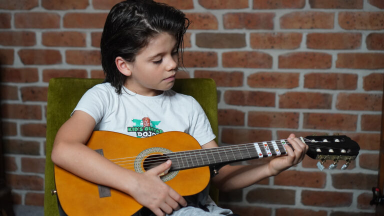 Why Guitar Lessons for a 5 Year Are A Great Introduction To Music